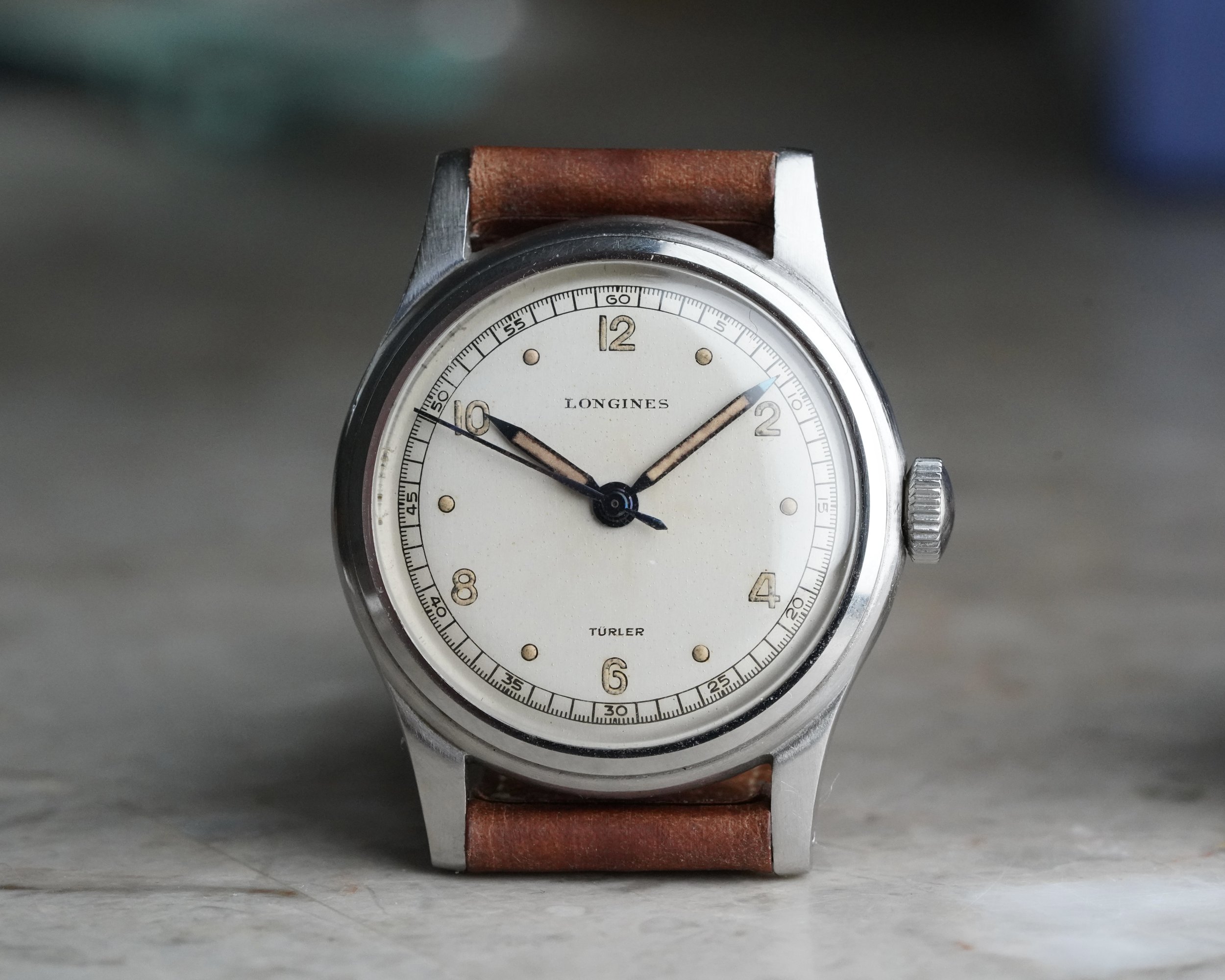 Longines Sei Tacche vers 1943, cadran crème double-signé Türler, boîtier acier 34 mm non étanche à 6 encoches, aiguilles feuille bleuies